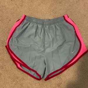 Pink and grey Nike shorts with built in underwear lining